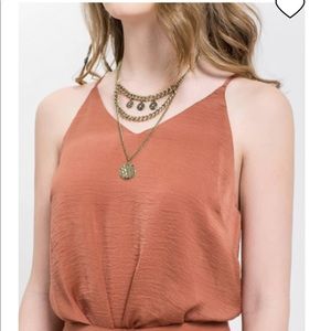 Silky shiny black bodysuit